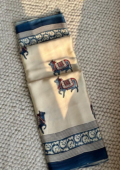 Cream Blue Animal Printed Ajrakh Modal Silk Saree with Traditional Border