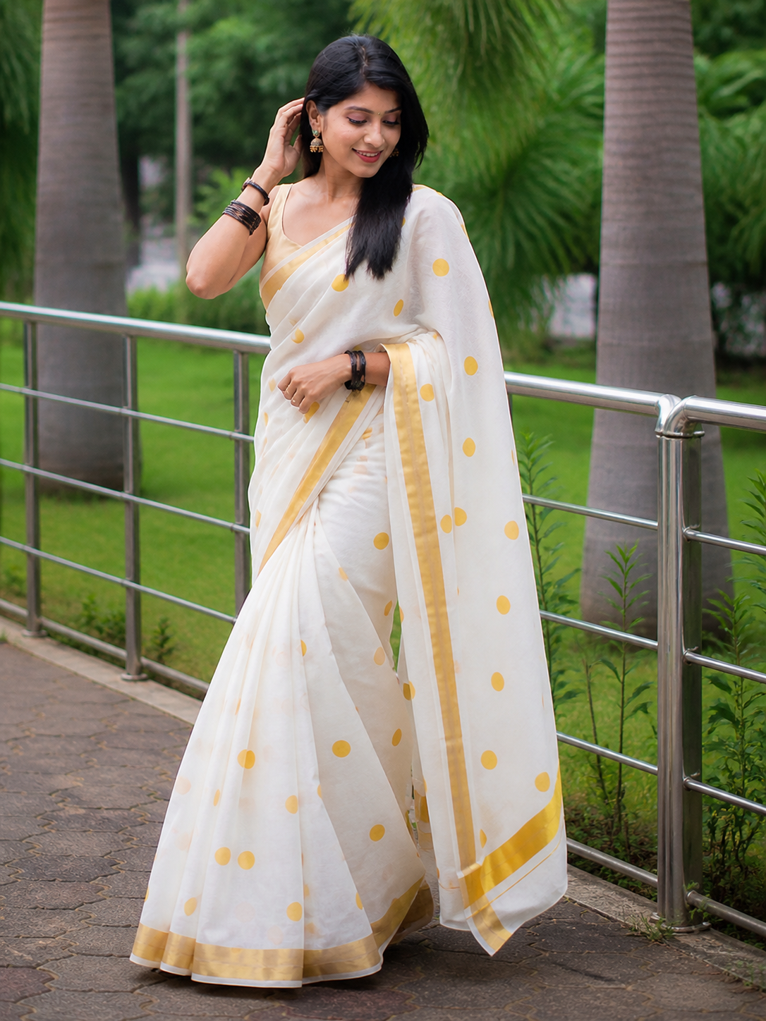 Elegant White Polka Dot Linen Saree with Golden Border