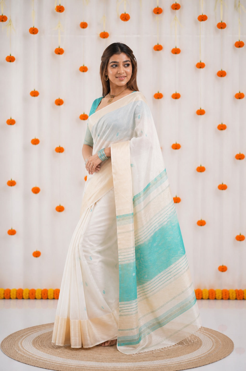 Off-White and Teal Linen Saree with Gold Zari Border