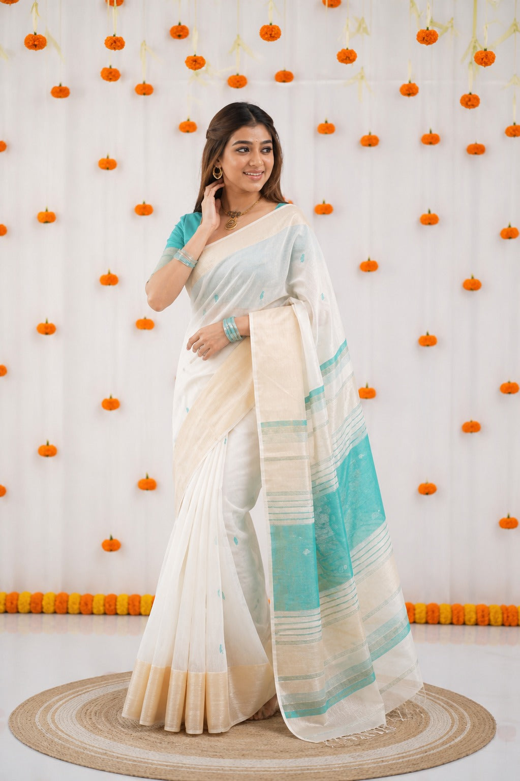 Off-White and Teal Linen Saree with Gold Zari Border