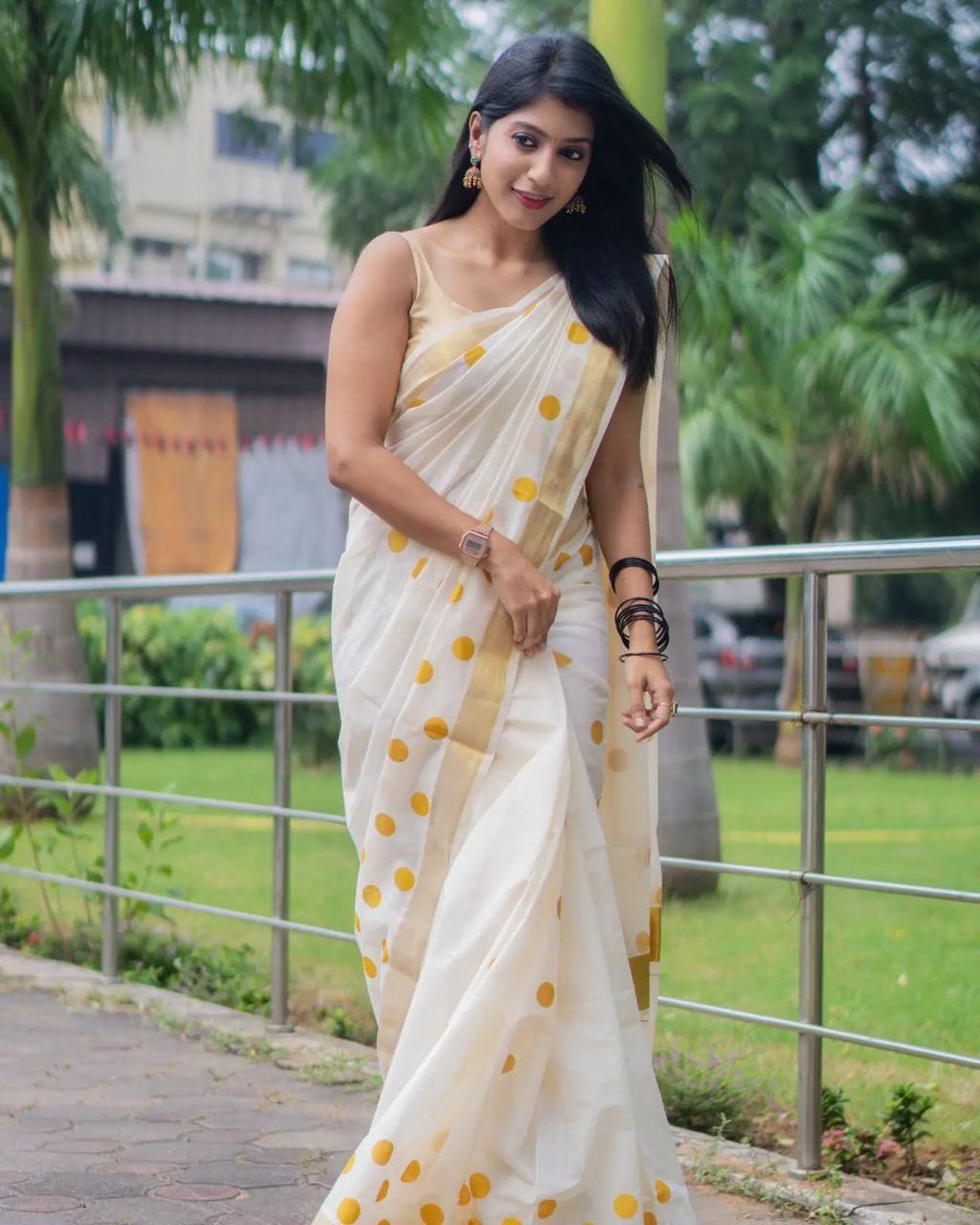 Elegant White Polka Dot Linen Saree with Golden Border