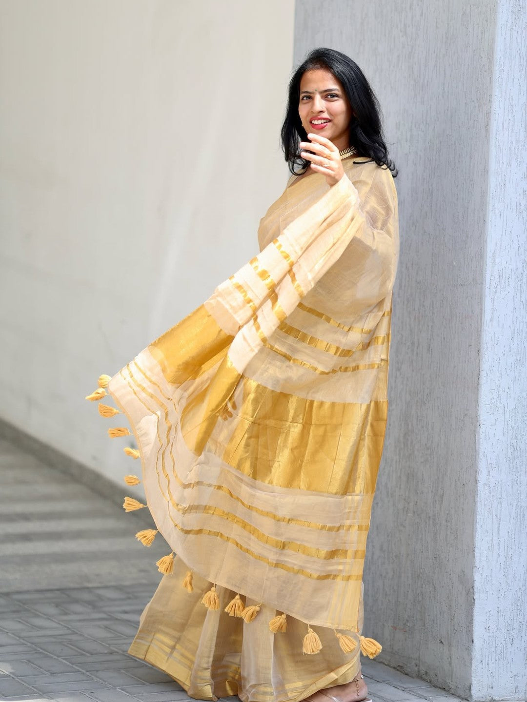 Golden Beige Soft Linen Saree with Zari Stripes & Tassel Border