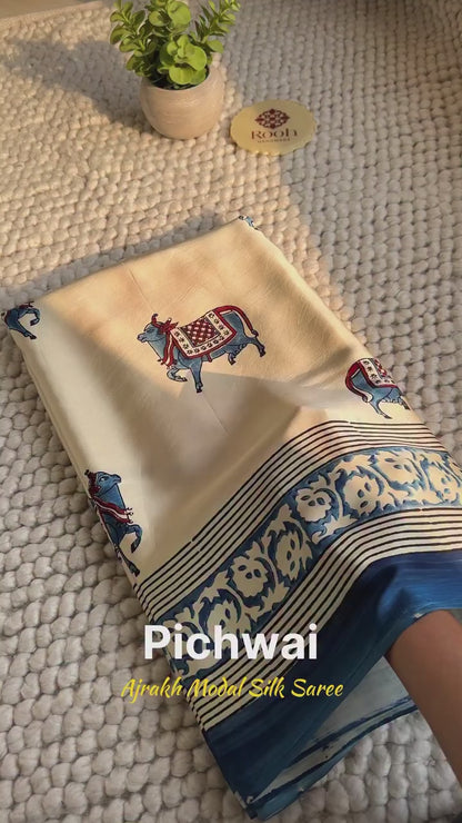 Cream Blue Animal Printed Ajrakh Modal Silk Saree with Traditional Border