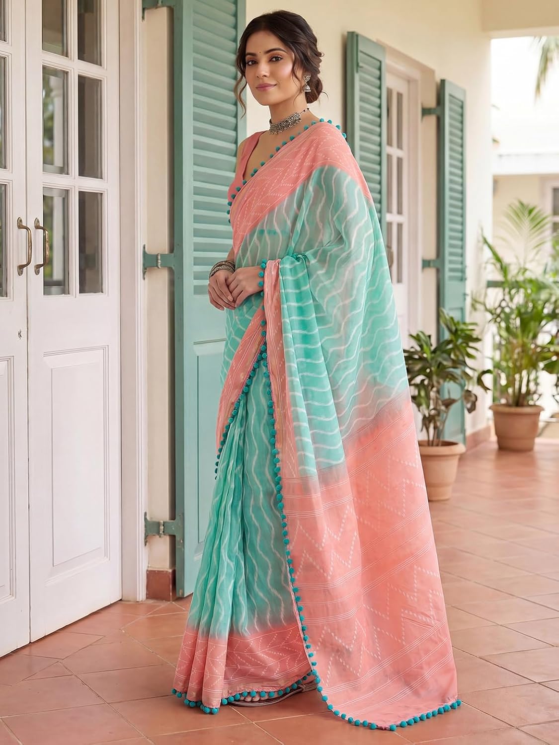 Aqua Blue and Peach Saree with Pom-Pom Lace