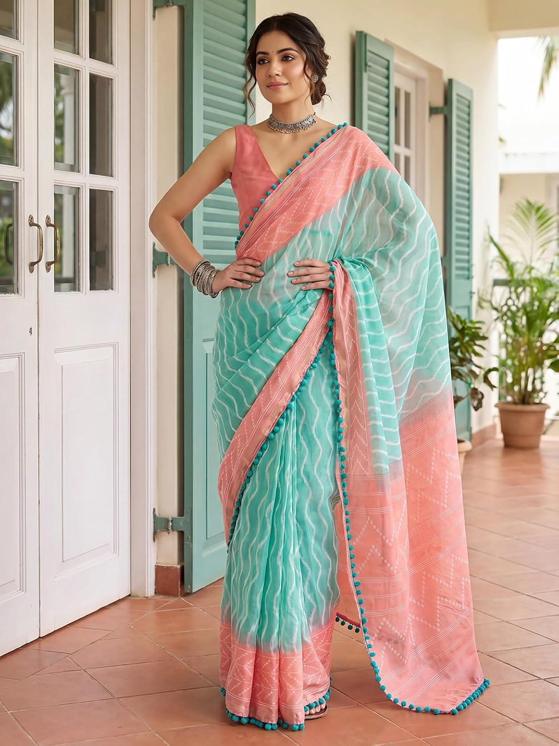 Aqua Blue and Peach Saree with Pom-Pom Lace