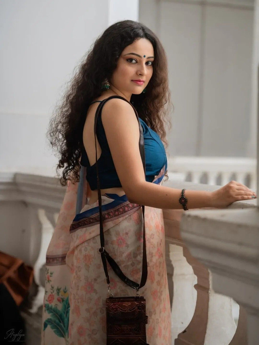 Cream Floral Printed Saree with Traditional Elephant Motifs
