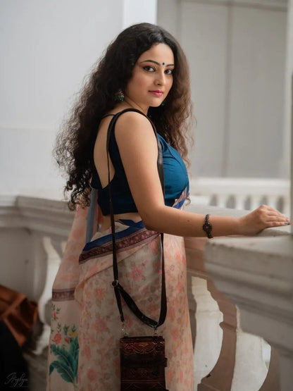 Cream Floral Printed Saree with Traditional Elephant Motifs