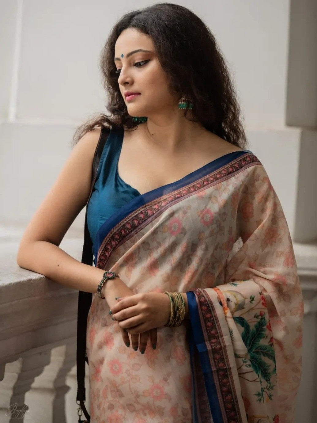 Cream Floral Printed Saree with Traditional Elephant Motifs