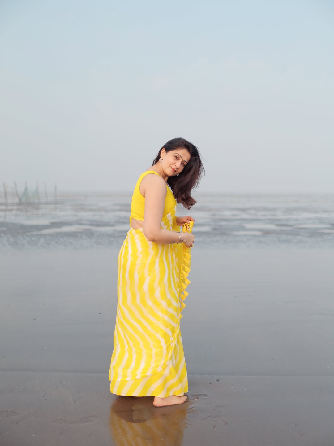 Radiant Yellow Chevron Leheriya Saree with Tassels