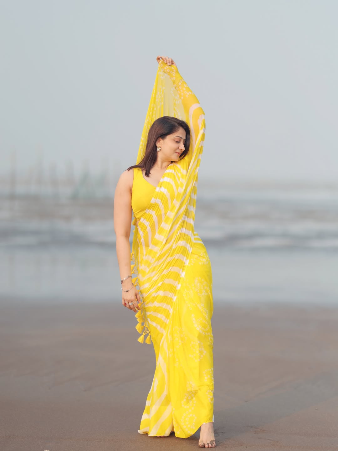 Radiant Yellow Chevron Leheriya Saree with Tassels