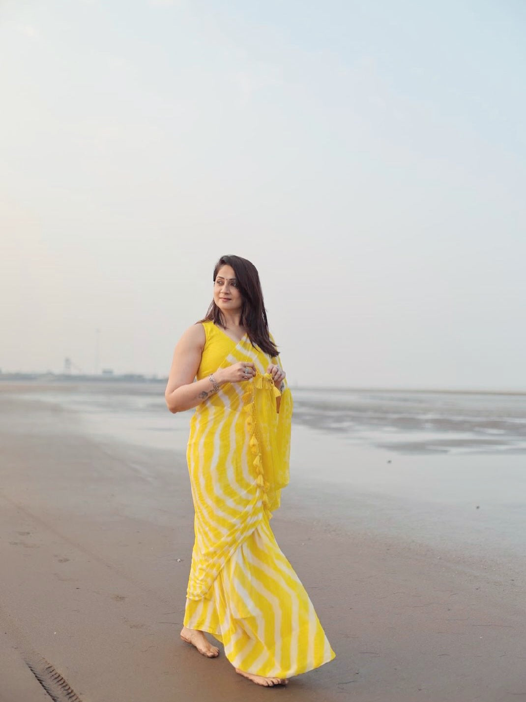Radiant Yellow Chevron Leheriya Saree with Tassels