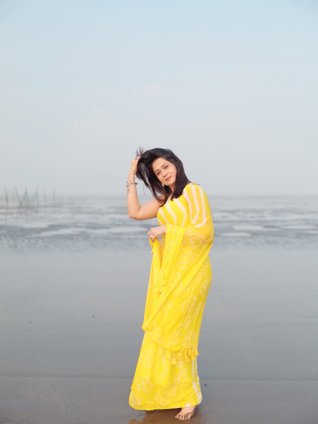 Radiant Yellow Chevron Leheriya Saree with Tassels