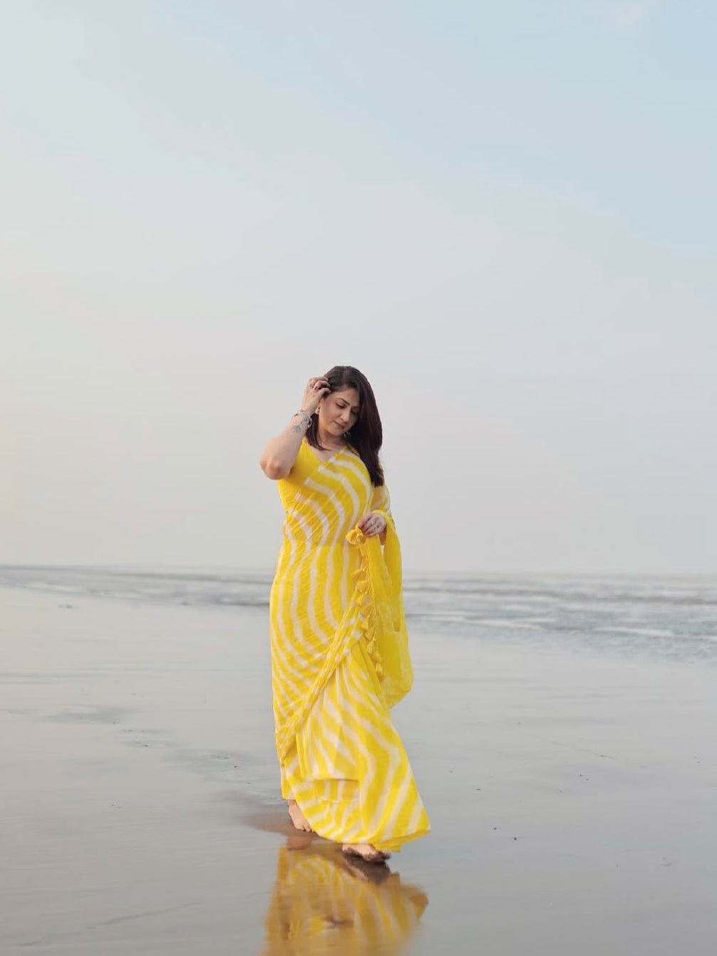 Radiant Yellow Chevron Leheriya Saree with Tassels