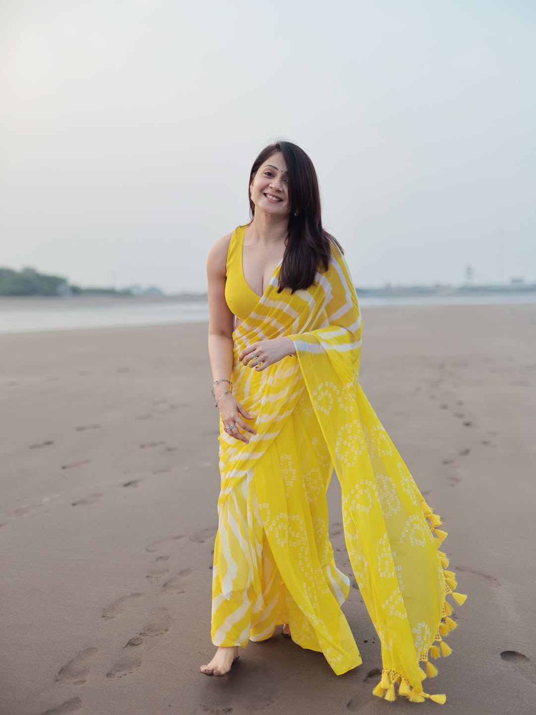 Radiant Yellow Chevron Leheriya Saree with Tassels