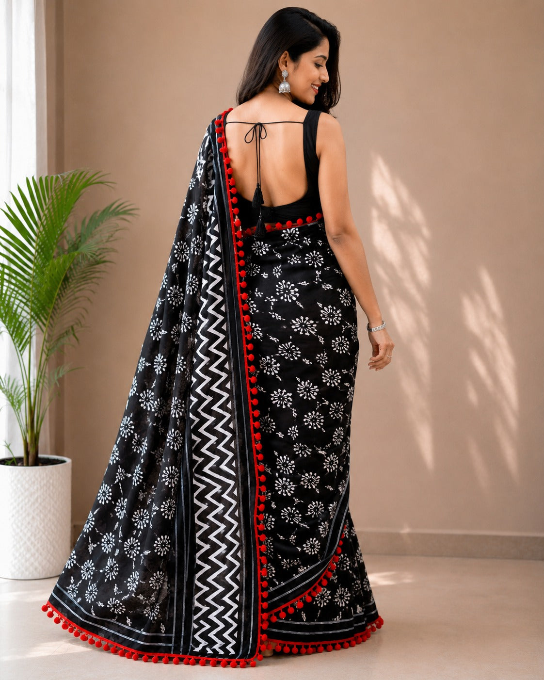Black and White Floral Print Saree with Red Pom-Pom Lace