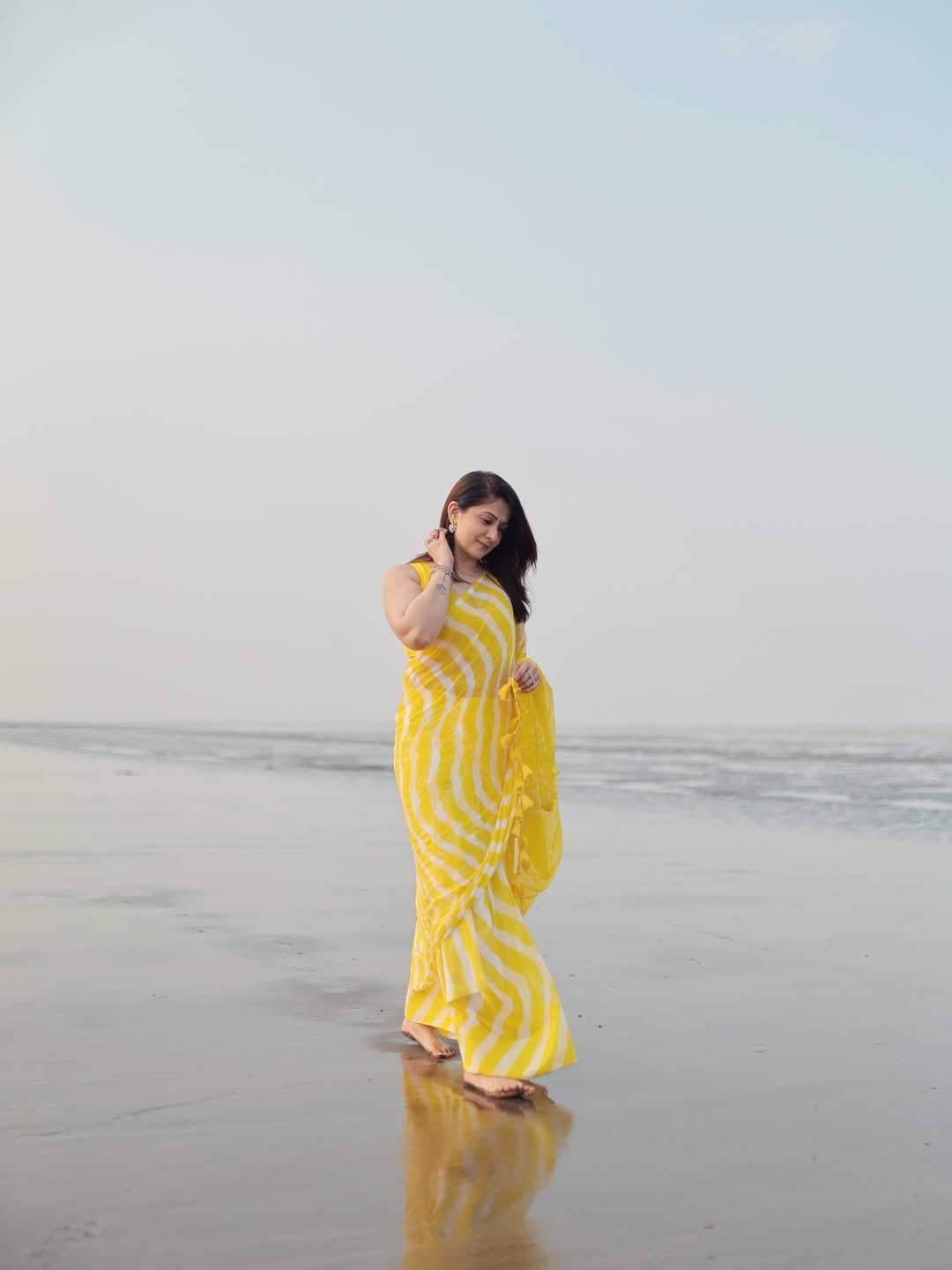 Radiant Yellow Chevron Leheriya Saree with Tassels