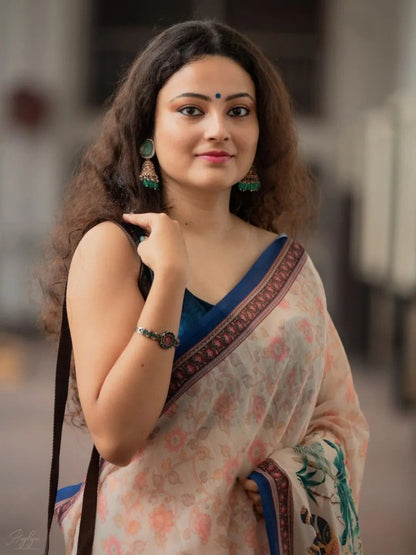 Cream Floral Printed Saree with Traditional Elephant Motifs